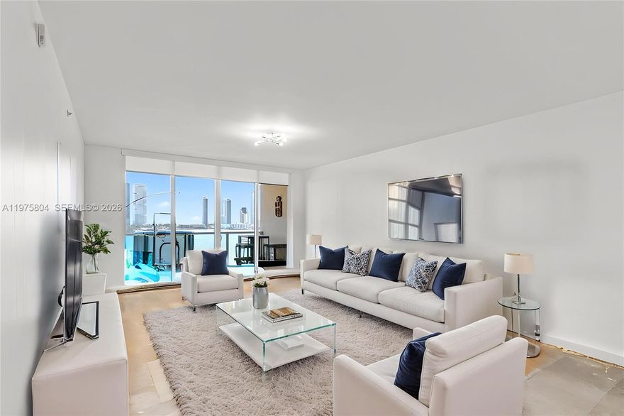 Breathtaking 12th-floor residence at the prestigious Aventura Marina II offering sweeping, unobstructed 180° views of the Atlantic Ocean, Intracoastal Waterway, and city skyline. Spanning 2,020 SF, this 2-bedroom, 3-bathroom split-floor plan showcases soaring ceilings, elegant tile flooring throughout, and a generous wrap balcony perfect for taking in the panoramic scenery. The open kitchen features granite countertops and ample cabinetry. The primary suite offers a spacious walk-in closet and an en-suite spa bath. Building amenities include two resort-style pools, a state-of-the-art fitness center, 24-hour guard-gated security, valet parking, yacht club, on-site boat docks, billiard and game rooms, and more. Located in one of South Florida's safest cities — minutes from Aventura Mall, fine dining, houses of worship, beaches, and major highways.
Please ask us about the 3-2-1 approved lender buydown. Meaning you get an interest rate as low as 3% with a monthly payment probably lower than what you're paying in rent!! Scroll down to "facts & features", click on "show more", then click "View virtual tour" for your Virtual Interactive Lifestyle Concierge! Ask anything. Explore everything.