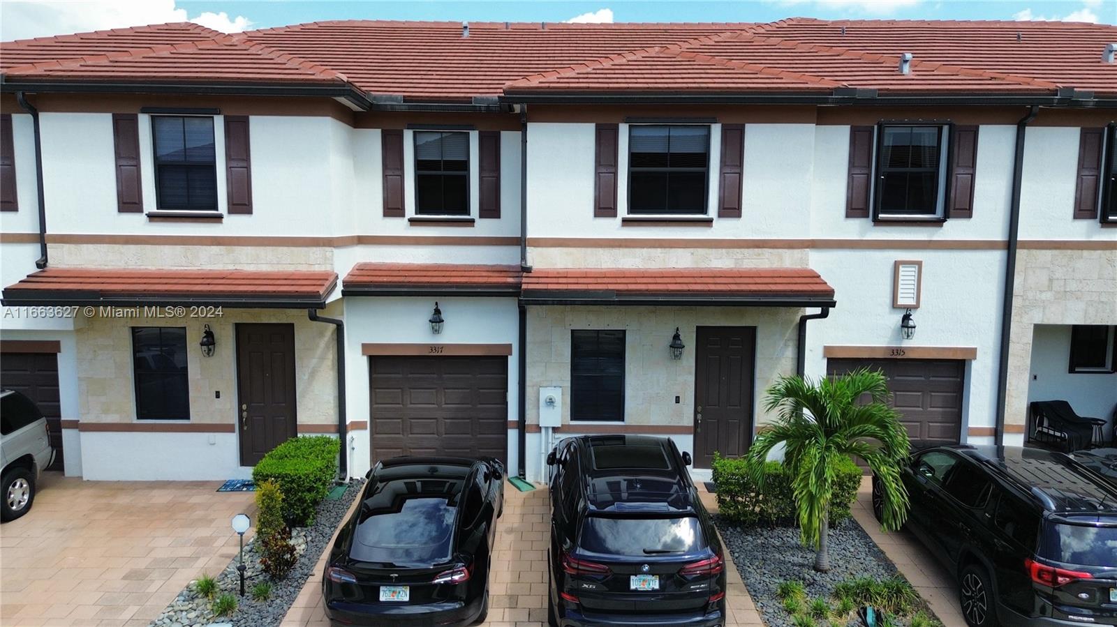 Motivated Seller! Price Reduced! Discover the perfect blend of style and comfort in this 3-bedroom, 3-bathroom townhouse located in the AquaBella community of Hialeah Gardens. The open layout, filled with natural light, offers plenty of space for both relaxation and entertainment. With modern finishes throughout, this home feels warm and inviting.
Step outside to your private, covered terrace with stunning lake views—perfect for hosting gatherings or enjoying quiet evenings. With no rear neighbors, you'll experience unmatched privacy.
This guard-gated community offers resort-style amenities, including a pool, fitness center, clubhouse, and children's play area. Close to highways, top schools, and shopping centers. Schedule a tour today!