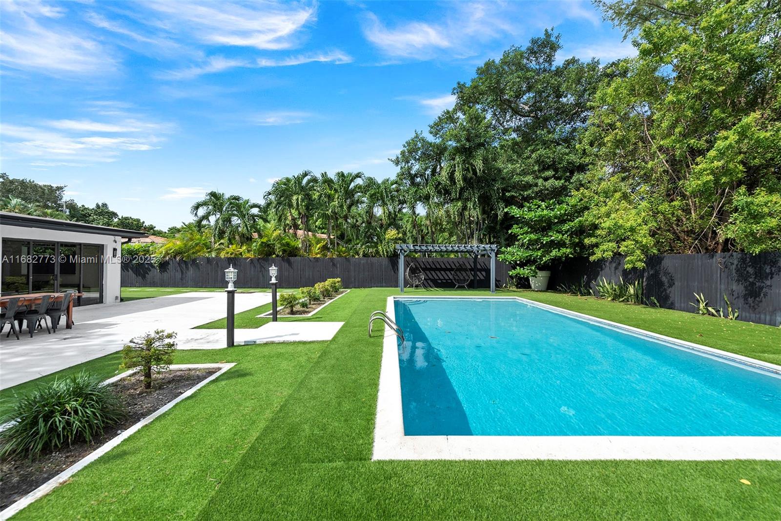 Discover unparalleled luxury in this sprawling estate spanning over 16,000 SF, just moments from the
breathtaking Intracoastal waterway. Recently modernized, this home boasts a newly revamped kitchen adorned
with Italian cabinets, quartz countertops, & top-of-the-line stainless-steel appliances, including a wall oven &
fridge. Recent upgrades such as a newer roof, impact doors, and windows offer both style & security. Step
outside to your own private oasis–a spacious backyard featuring an oversized pool and newly installed turf, ideal
for entertaining or soaking up the Miami sun with family & friends. Beyond its undeniable charm, this property
presents a lucrative investment opportunity, with potential monthly rentals fetching $20k+.Don't miss your
chance to own a piece of paradise.