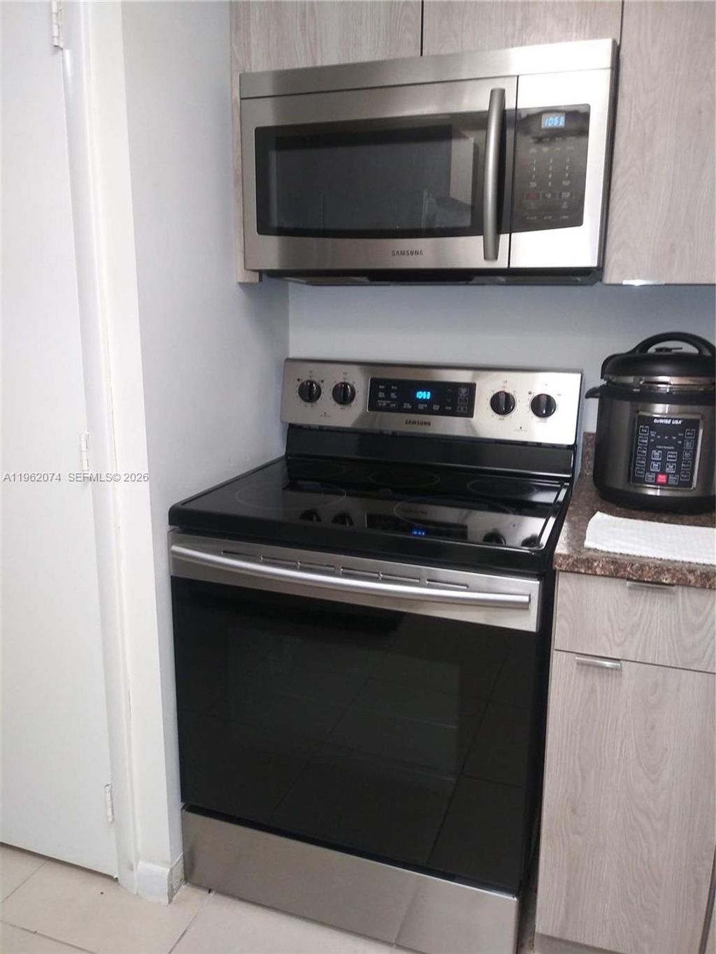 Photo of 4172 Inverrary Dr #310, Lauderhill, FL 33319 (MLS # A11962074)