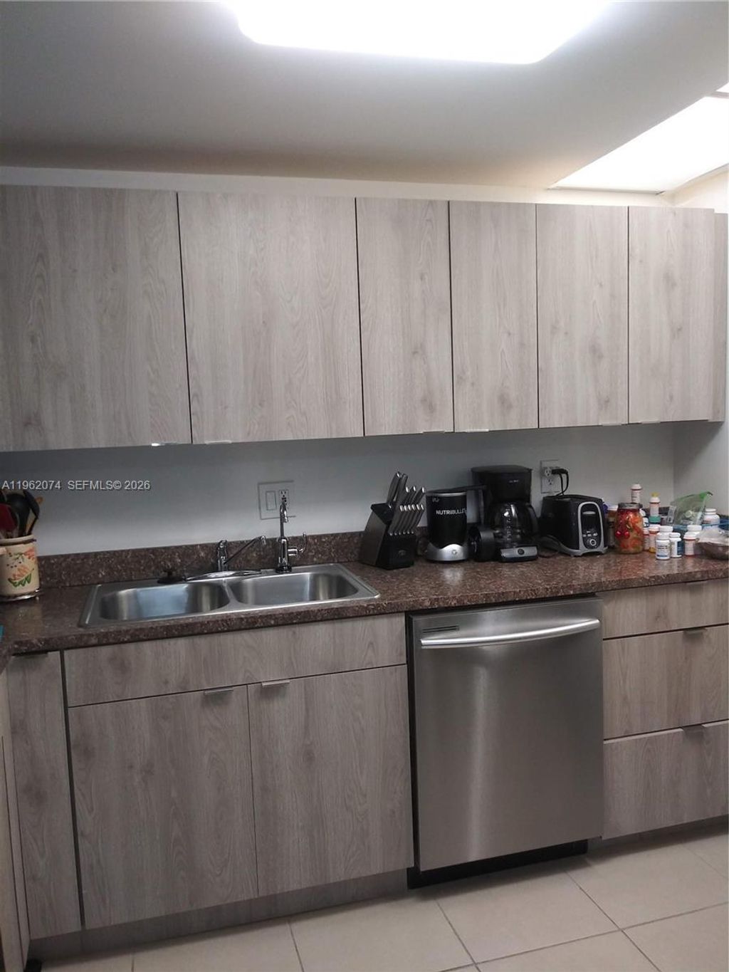 Photo of 4172 Inverrary Dr #310, Lauderhill, FL 33319 (MLS # A11962074)