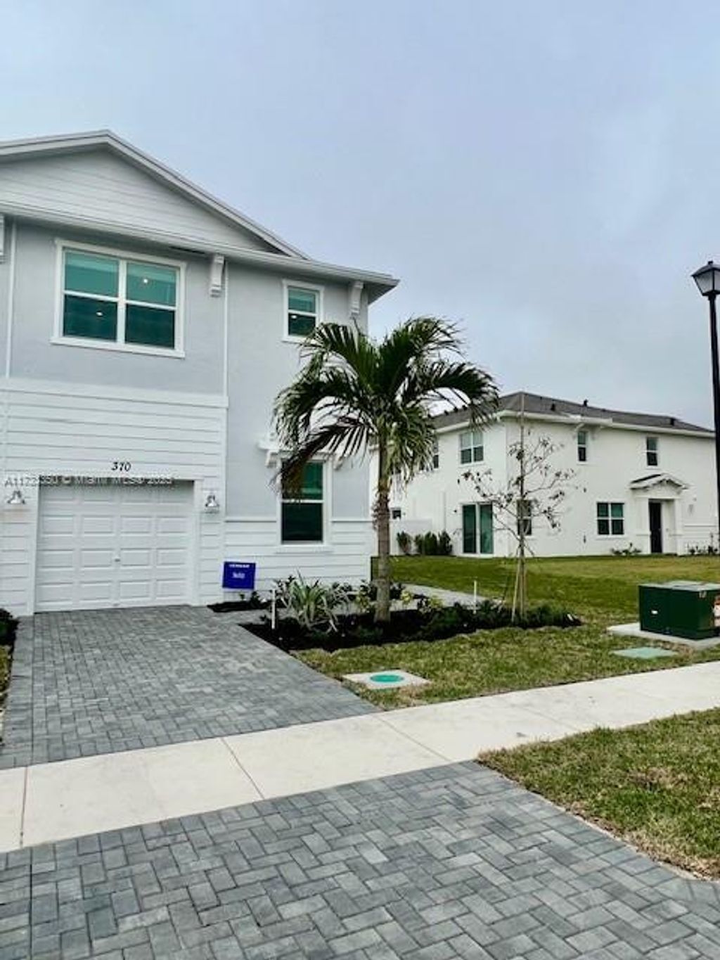 Photo of 370 Crossoak Ln, Port Saint Lucie, FL 34984 (MLS # A11733350)