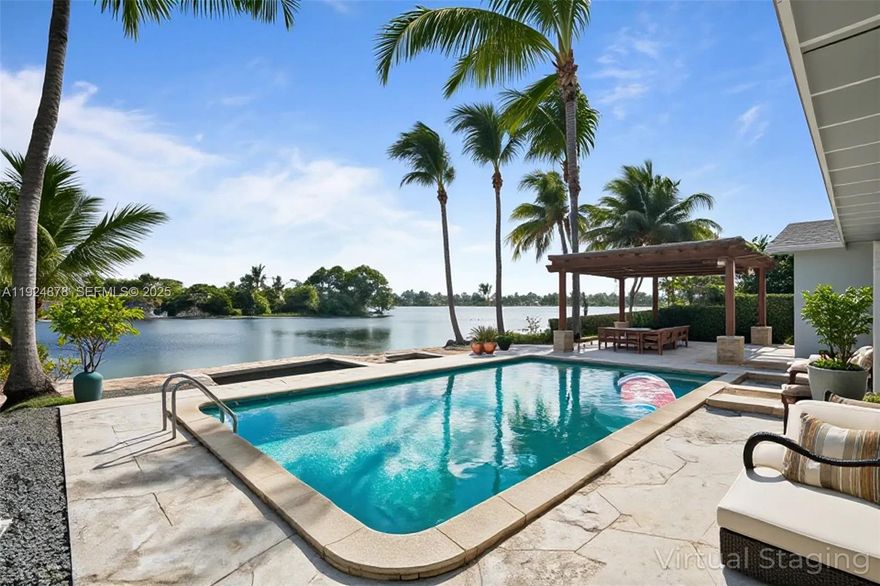 Spectacular lakefront 4-bedroom, 3-bath, single-story home available for rent in the family-friendly Saga Bay community! With expansive, peaceful lake views, this beautifully upgraded property features an updated kitchen with stainless steel appliances, a newer roof, impact windows and doors, and a formal dining room. Enjoy outdoor living on the oversized covered porch and pergola, perfect for relaxation or family and friends gatherings, complete with a pool and lush landscaping. Pool and Yard maintenance is included. Saga Bay offers exceptional nearby amenities, including tennis and pickleball courts, parks, and lake beach access — all within walking distance. Available now — don’t miss out!