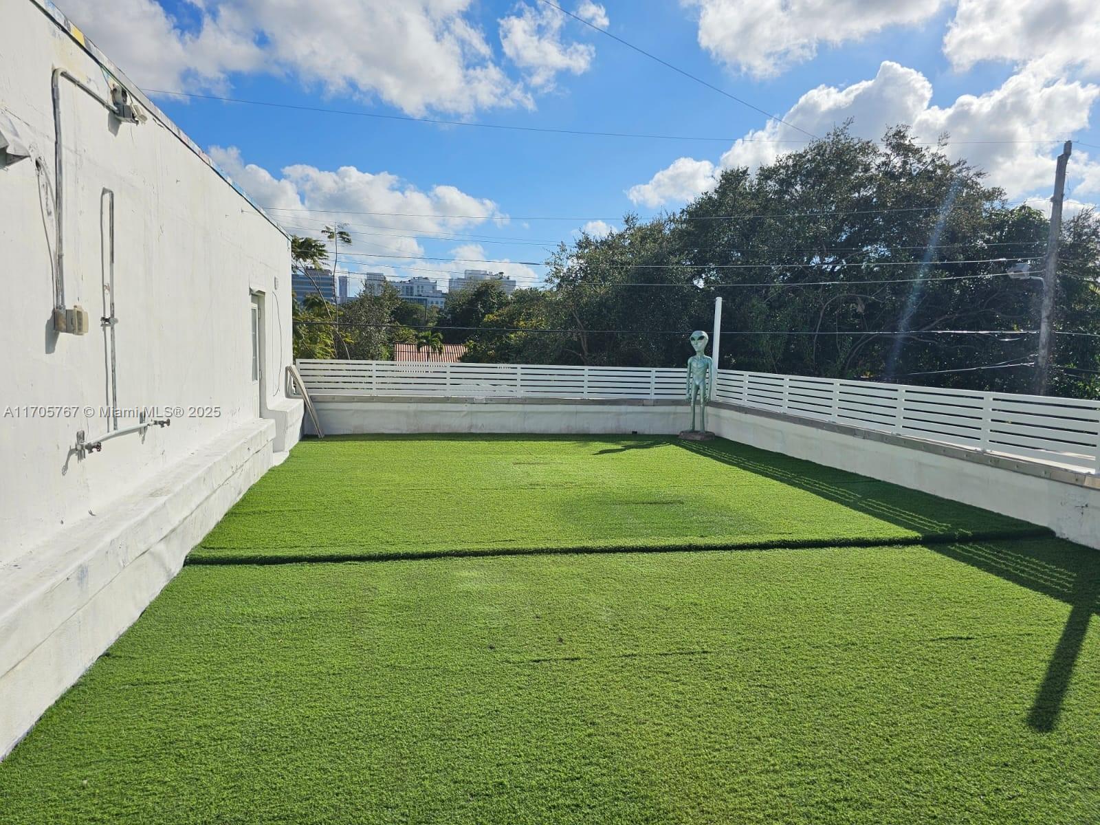 Located in the vibrant Wynwood/Midtown area. 3946 sq/ft loft-style space occupies the entire 2nd floor of a 2-story warehouse building. Consists of 2 open units, each w/ its own entrance, connected by a door at the end of both. Enjoy seamless indoor-outdoor living with a massive 1200 sq/ft private terrace. Features 4 full bathrooms with granite countertops, polished concrete floors, exposed ducts, and abundant natural light. The industrial-style kitchen boasts a large stainless steel eat-in island, restaurant-grade stove/oven, and custom countertops. Furnished with a custom bar, pool table, 2 beds, & couches.1 assigned off-street parking & add'l off-street guest parking. Rent includes Electric & Water. Perfect for creative professionals or those seeking a unique space in the Wynwood area!