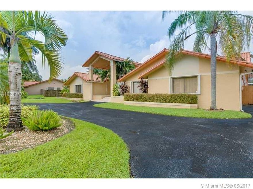 Beautifully appointed and perfectly laid out Falls area home! Enjoy cathedral ceilings, marble floors, stunning pool & patio & a family friendly floor plan! Located on a quiet, picturesque street. Fantastic private & public schools nearby. Superb dining & shopping around the corner & minutes away from Turnpike & 826. Sale is subject to seller's lender's approval.