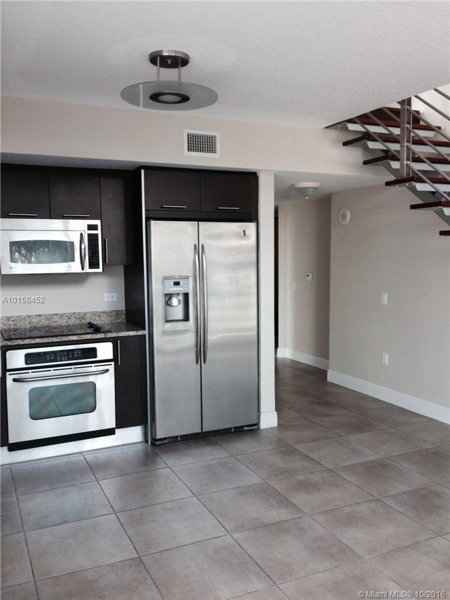 Best line in the building corner facing NE. Two story loft style 2/2. Master suite upstairs. Easy to show.
