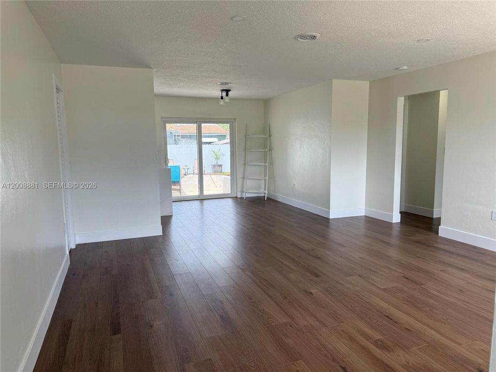 Photo of 7525 Garfield St, Hollywood, FL 33024 (MLS # A12008881)
