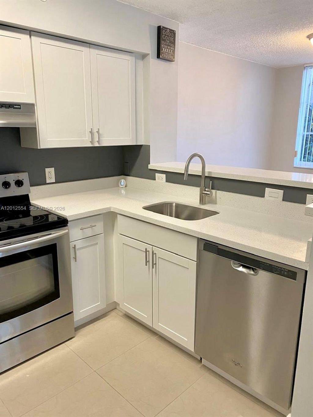 Photo of 12118 Saint Andrews Pl #107, Miramar, FL 33025 (MLS # A12012554)