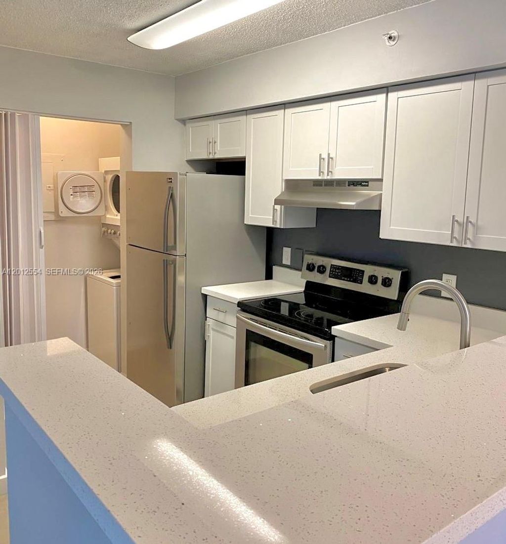 Photo of 12118 Saint Andrews Pl #107, Miramar, FL 33025 (MLS # A12012554)