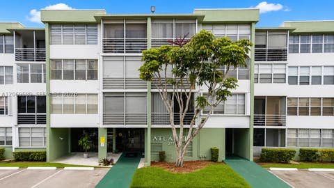 Photo of 2771 Taft St #407, Hollywood, FL 33020 (MLS # A12069589)