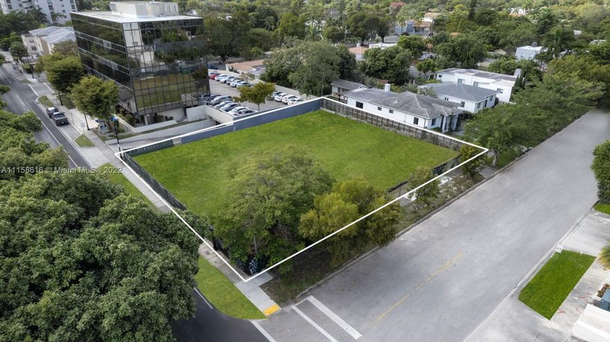 This premier corner site is a rare availability in Miami's well established "The Roads" Neighborhood. Its liberal zoning allows for up to 8 stories of possible office, hotel, multi family, or condo development. Prominently positioned between bustling downtown Miami and historic Coconut Grove, its location offers easy access to conveniences such as major roads, hospitals, the airport and nearby professional destinations like the Financial District. This rare opportunity 14,040 SF lot with highly efficient proposed plans for an 8 story tower featuring 46 residences and 1 commercial suite is a find.
