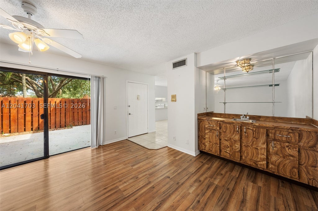 Photo of 3118 Spanish Wells Dr #15-C, Delray Beach, FL 33445 (MLS # A12041703)