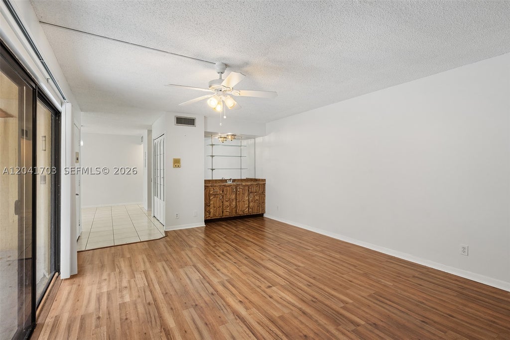 Photo of 3118 Spanish Wells Dr #15-C, Delray Beach, FL 33445 (MLS # A12041703)