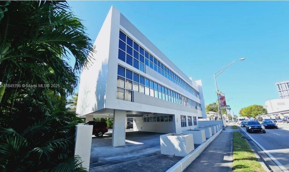 Located at 2424 South Dixie Hwy, this versatile, highly visible iconic landmark office building offers unparalleled flexibility and functionality. The ground floor boasts an open layout perfect for retail or showroom use, complemented by underground storage space for added convenience. The second and third floors feature spacious office plates, each outfitted with private offices, bathrooms, collaborative open areas, and conference rooms, making it an ideal workspace for any business. With independent access to each floor, owner-users have the option to occupy part of the property while leasing remaining space to third-party tenants, offsetting carrying costs and maximizing ROI.