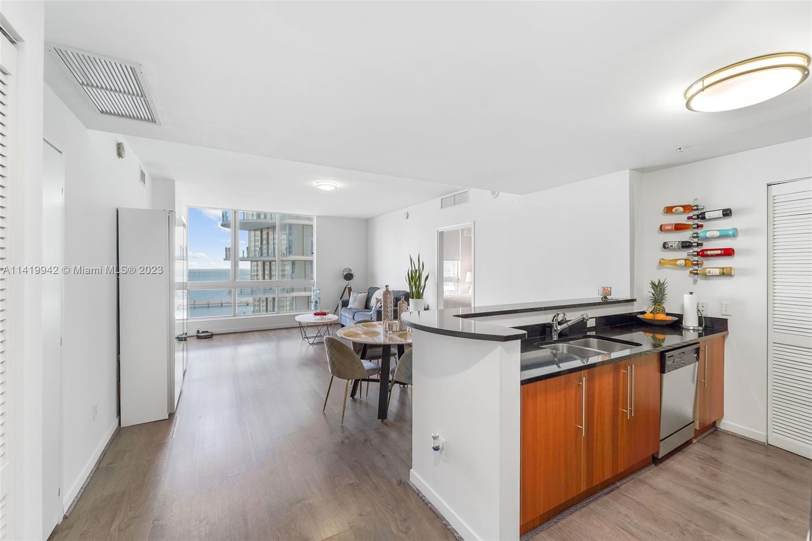 Fabulous bay views from this 2/2 split bedroom plan, tile floors throughout, South exposure. Italian cabinetry, granite countertops, stainless steel appliances, cable and Internet included. One assigned parking space. Walk to Whole Foods Market, Bayfront Park, Bayside, Metro mover, Novikov Restaurant and Joe & The Juice downstairs plus 17-screen Silverspot Cinema at Met Square. Building offers luxurious life style, 24-hr front desk attended. Chic downtown living at its best! Pool is currently closed, waiting for bids to repair the leak. Buyer will have to honor lease. Rented until 1/31/24