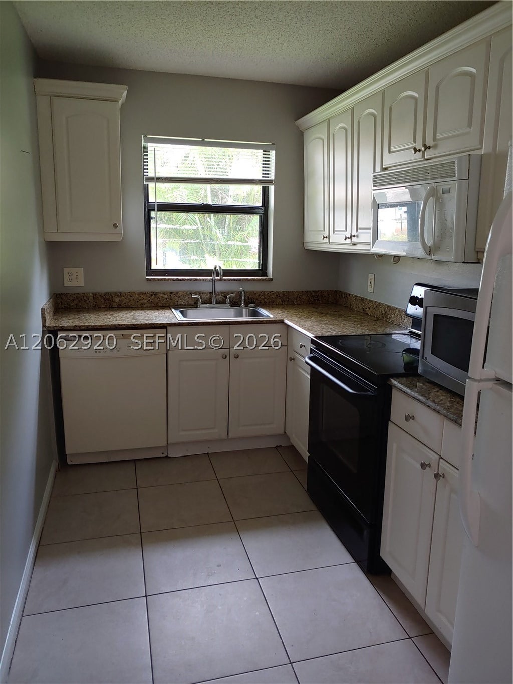 Photo of 5060 Sanctuary Way #E, West Palm Beach, FL 33417 (MLS # A12062920)