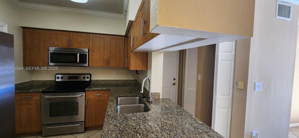 Photo of 6482 Emerald Dunes Dr #201, West Palm Beach, FL 33411 (MLS # A11975544)