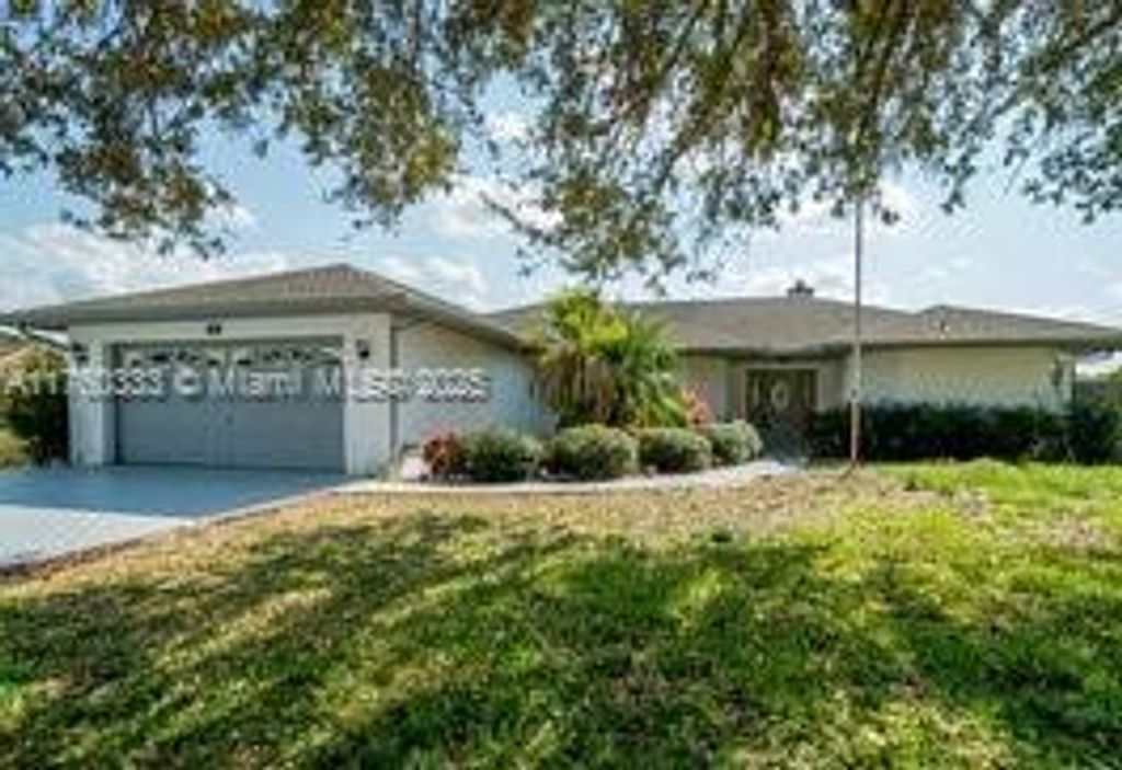 Photo of 242 SE Duval Ave, Port Saint Lucie, FL 34983 (MLS # A11760333)