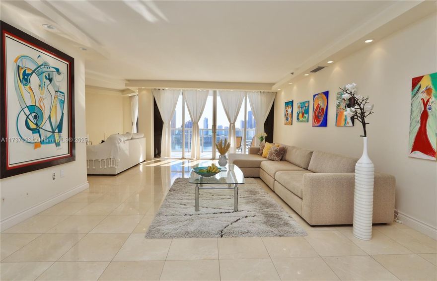 THIS 3 BEDROOM 3 BATH  CORNER HOME IN THE SKY HAS ALL THE FUNDAMENTALS TO MAKE YOUR OWN MASTERPIECE. OPEN KITCHEN, MARBLE FLOORS, UPDATED LIGHTING, FLAT CEILINGS, LARGE WALK-IN CLOSET, AND 3 BALCONIES OFFERING EXPANSIVE VIEWS OF THE INTRACOASTAL, OCEAN, AND DOWNTOWN MIAMI.  THE 4000 BUILDING WILL SOON BE UNDERGOING EXTENSIVE RENOVATIONS INCLUDING A NEW LOBBY AND A NEW POOL DECK TO RIVAL ANY RESORT.  LIVE IN PRESTIGIOUS WILLIAMS ISLAND WITH FULL AMENITIES: 15 TENNIS COURTS, 4 PICKLE BALL COURTS, 3 RESTAURANTS, STATE OF THE ART SPA, MARINA, WALK/JOG PATH, KIDS PLAYGROUND, COURTESY BUS, WALK TO HOUSES OF WORSHIP AND SO MUCH MORE....