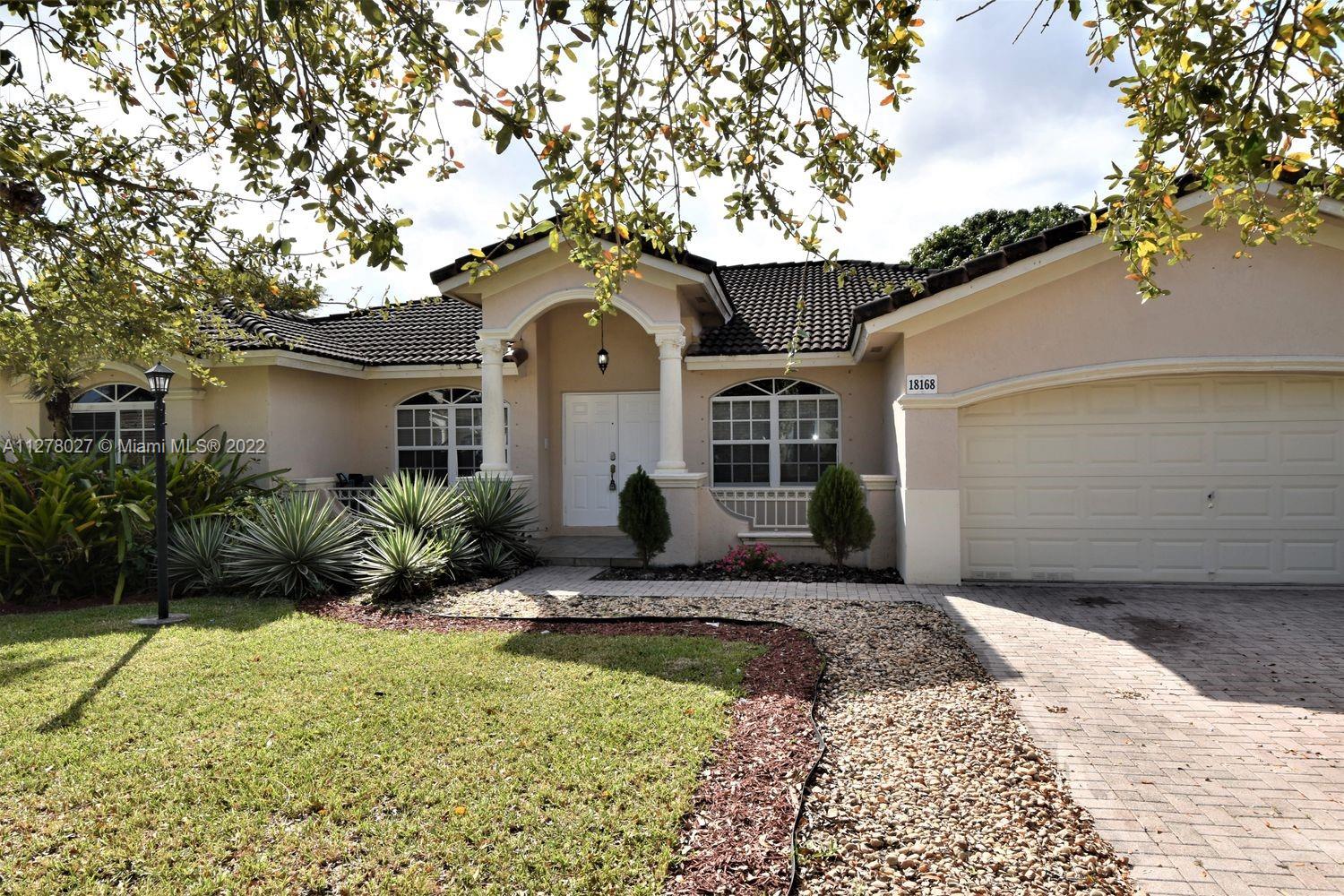 You will love making this beautiful house your new home! The front exterior boasts a two-car garage, a covered entrance, extended drive and charming curb appeal. The interior is lined with stylish tile, plush carpet flooring and each room offers plenty of space for making long-lasting memories. Cook meals in the kitchen with stainless steel appliances, beautiful white cabinetry, gleaming countertops, and recessed lighting. You'll love spending time in the bedrooms with built-in closets, nice windows, base molding and plenty of space to relax. The bath includes a soaking tub, separate shower, and a sink. The backyard features a covered patio, the perfect place to entertain or relax.