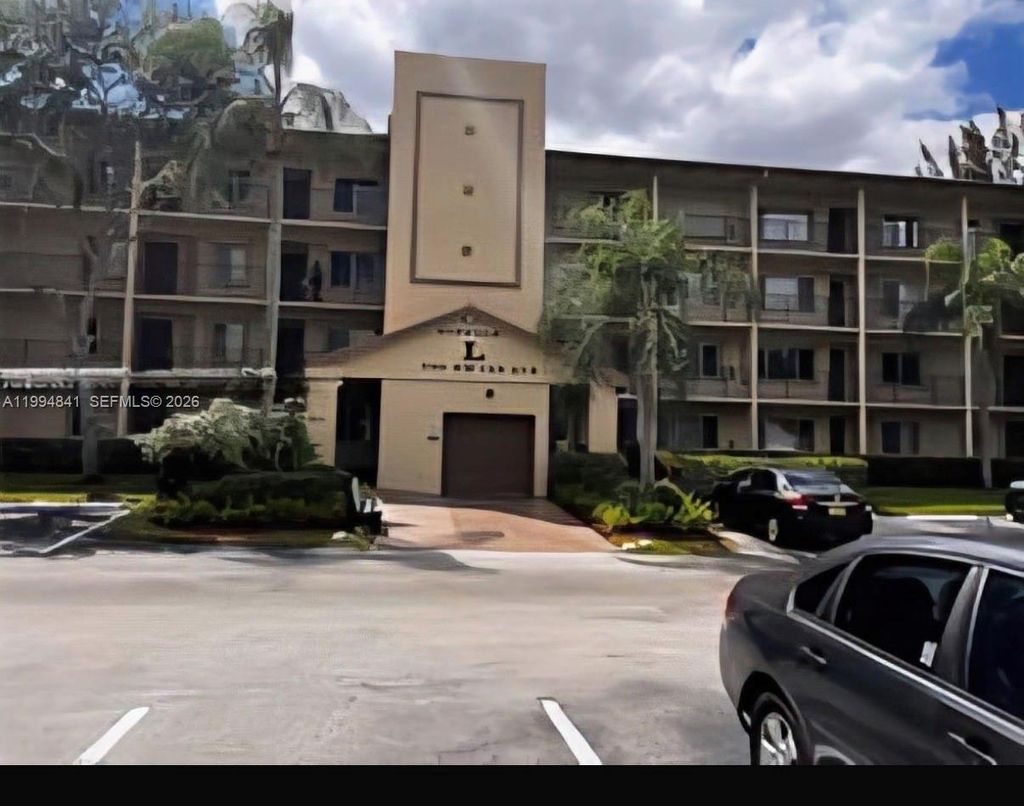 Photo of 900 SW 142nd Ave #114L, Pembroke Pines, FL 33027 (MLS # A11994841)