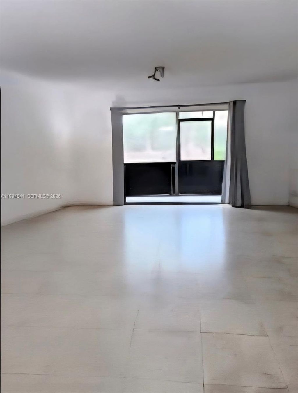 Photo of 900 SW 142nd Ave #114L, Pembroke Pines, FL 33027 (MLS # A11994841)