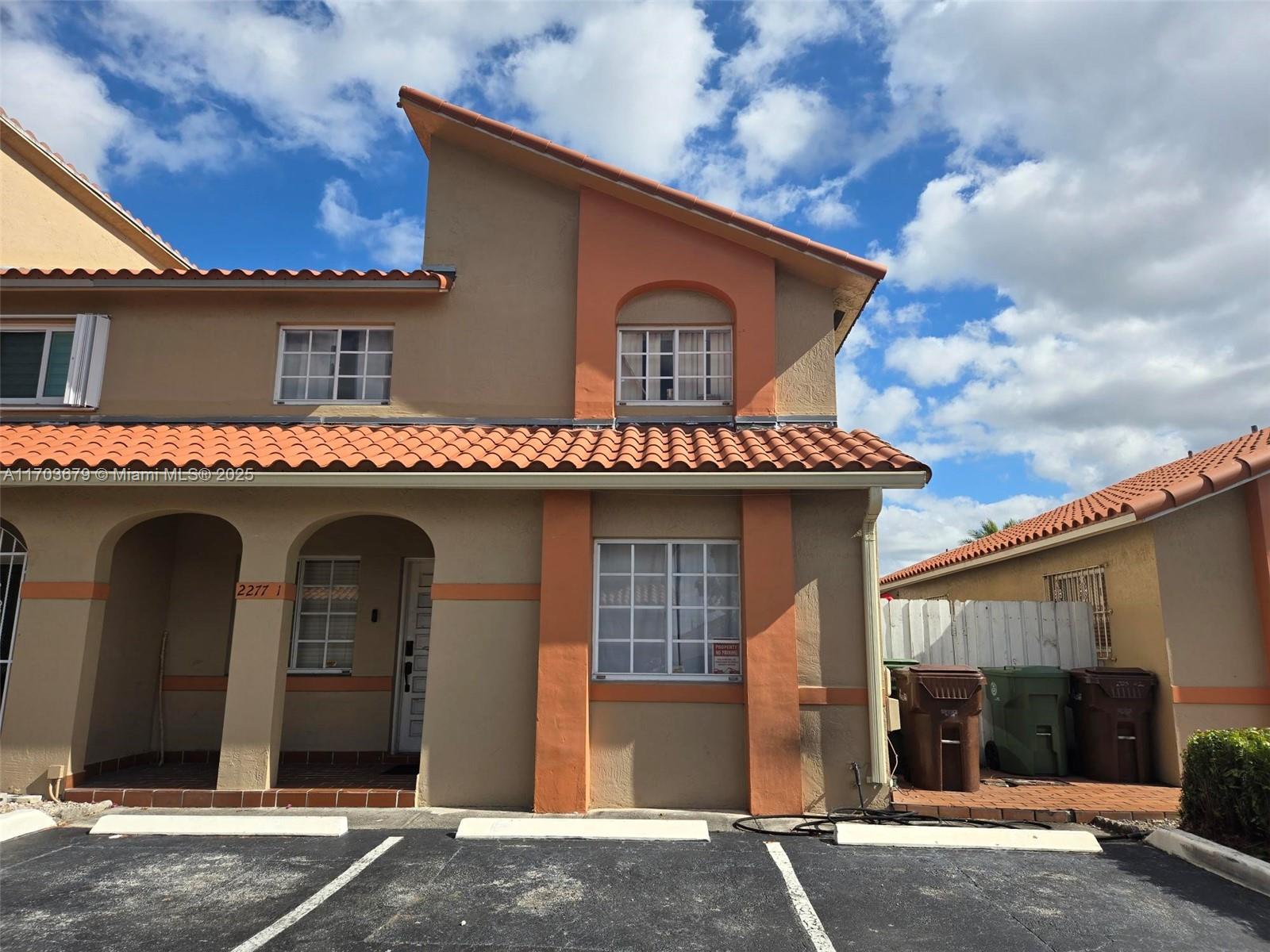 Easy showings!! Highly desirable area in Hialeah; West Palm Gardens Villas. Corner, large, two- story unit with three assigned parking spaces. One bedroom and full bathroom on first floor. Second floor features two large bedrooms with spacious full bathroom and primary bedroom with en-suite. Master bathroom features large bathtub, two sinks and huge storage area! Unit is ready for TLC and upgrades! Located right behind Palmetto Hospital with cul-de-sac to ensure privacy. Beautiful public park within walking distance, police & fire stations minutes away.