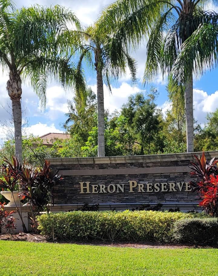 Absolutely beautiful corner townhouse in prestigious Heron Preserve! This spacious 3-bedroom, 2.5-bath home features a den and a 2-car garage. Enjoy upgrades including impact windows, granite countertops, 42” wood cabinets, tile flooring downstairs, and carpet upstairs. The oversized master suite boasts walk-in closets and an additional 11x12 retreat—ideal for a sitting area or home office. Upstairs den can serve as a media room or workspace. Don’t miss this beautifully maintained home in a prime location!