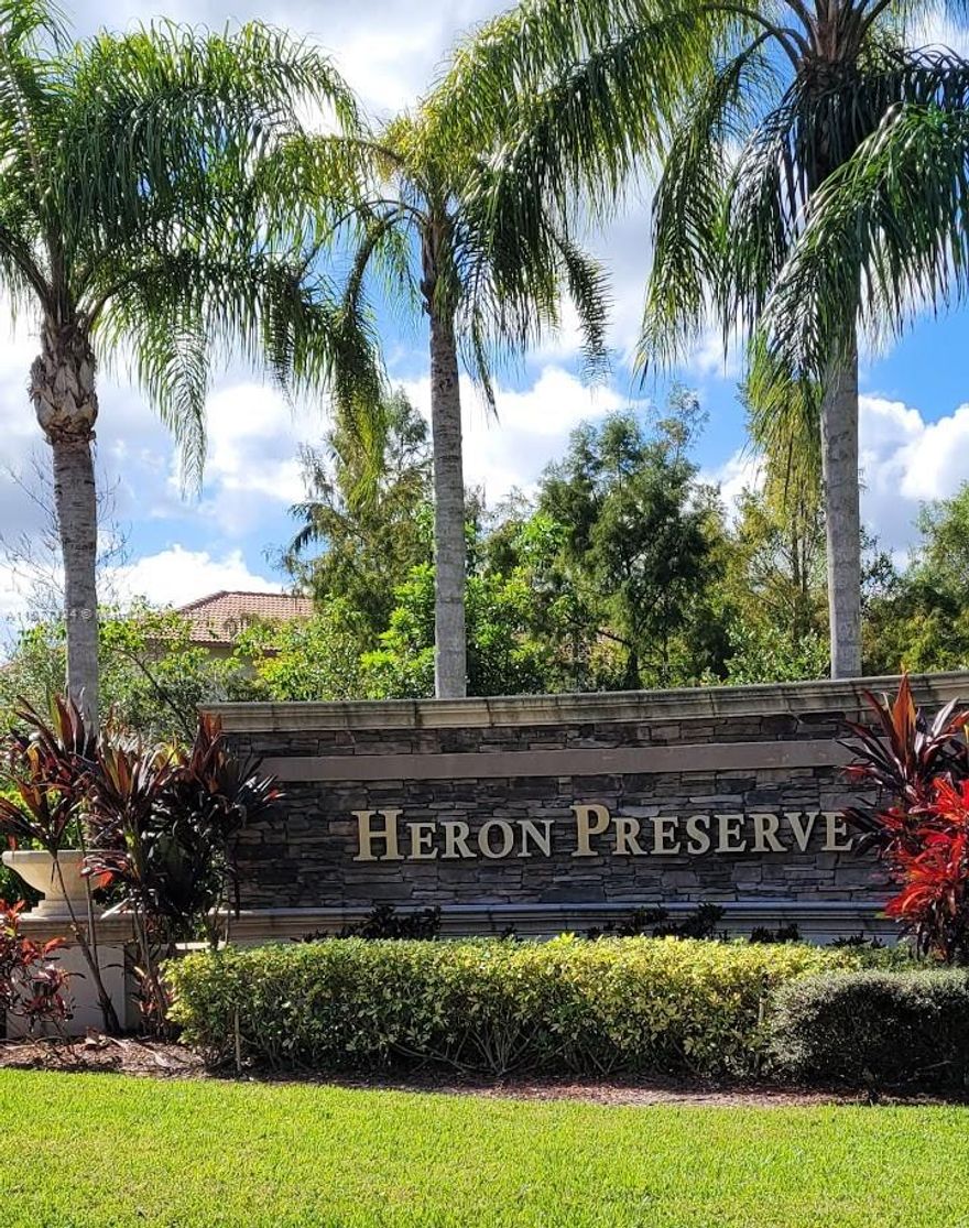 Absolutely beautiful corner townhouse in prestigious Heron Preserve! This spacious 3-bedroom, 2.5-bath home features a den and a 2-car garage. Enjoy upgrades including impact windows, granite countertops, 42” wood cabinets, tile flooring downstairs, and carpet upstairs. The oversized master suite boasts walk-in closets and an additional 11x12 retreat—ideal for a sitting area or home office. Upstairs den can serve as a media room or workspace. Don’t miss this beautifully maintained home in a prime location!