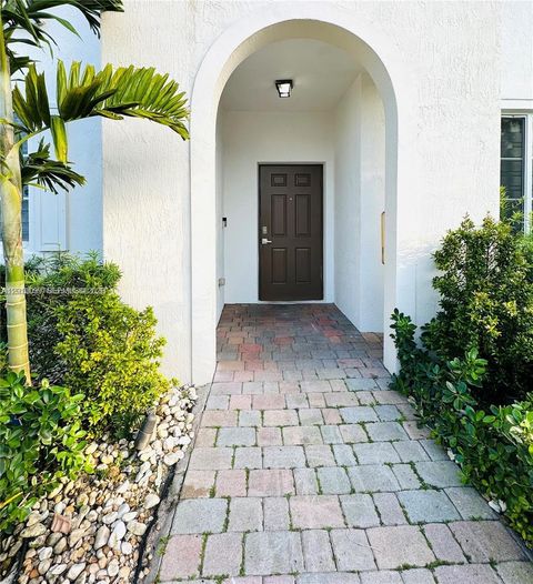 Photo of 12430 SW 50th St #105, Miramar, FL 33027 (MLS # A12010099)