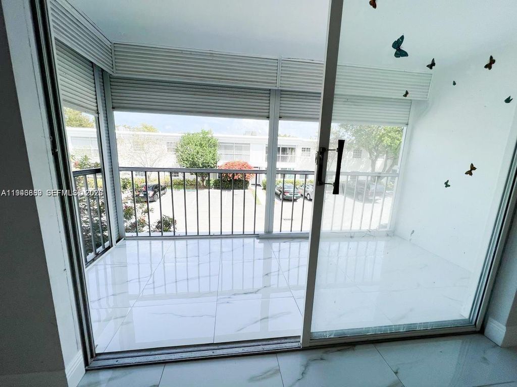 Photo of 6395 Bay Club Dr #4, Fort Lauderdale, FL 33308 (MLS # A11946889)