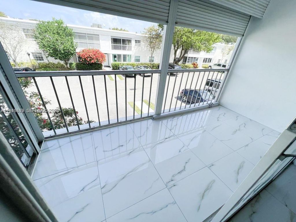 Photo of 6395 Bay Club Dr #4, Fort Lauderdale, FL 33308 (MLS # A11946889)