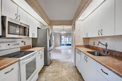 Photo of 13105 SW 16th Ct #101L, Pembroke Pines, FL 33027 (MLS # A11870714)