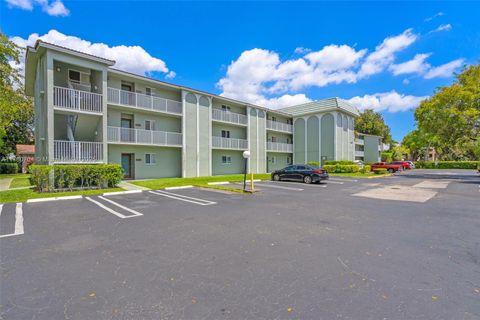 Photo of 11651 Royal Palm Blvd #306, Coral Springs, FL 33065 (MLS # A11780704)