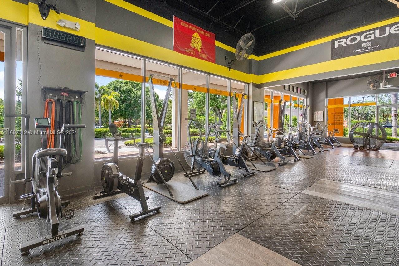 Well-established profitable, fully-equipped turn-key CrossFit gym. CrossFit LPF averages 175-200 members. Located in the Township Plaza in Coconut Creek which allows the business to pool a client base from over 380,000 residents with an average household income in excess of $80,000 per year in a 5-mile radius. 11 year CrossFit affiliate. 4,270 sq feet corner open space with multiple entrances/exits, wraparound windows w/ natural light, high ceilings. Ample parking. Top of the line CrossFit equipment by Rogue, Concept 2 and Assault. Dedicated warm-up/cool down area, three restrooms, shower, outdoor covered workout area, lifting platforms. Easily accessible to the Turnpike, Sawgrass Expy and I-95.
