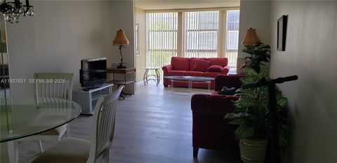 Photo of 851 Three Islands Blvd #406, Hallandale Beach, FL 33009 (MLS # A11937651)