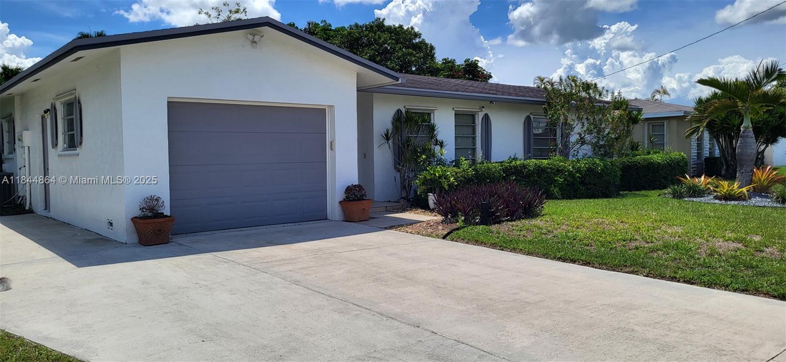 Stylish and well-maintained contemporary home tucked away on a quiet cul-de-sac with no HOA. Expansive family room flows to a screened porch with peaceful water views. Step outside to your private floating dock—ideal for fishing, grilling, or sunset lounging. Side patio and cabana bath offer easy potential for a future pool. The spacious eat-in kitchen features Corian countertops, recessed lighting. Primary suite includes a walk-in closet, and all bedrooms offer generous storage. Flexible living room can serve as a 4th bedroom. Neutral tile floors, ceiling fans, garage, RV/boat parking, and sprinkler system. Prime location close to everything!