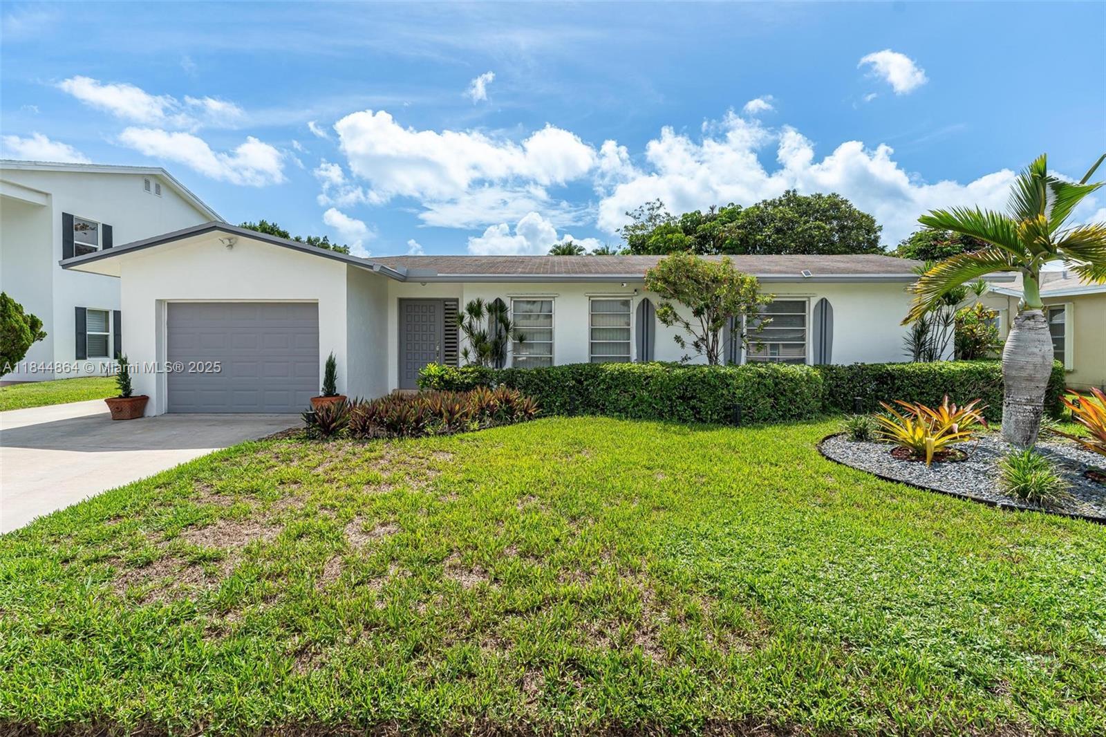 Stylish and well-maintained contemporary home tucked away on a quiet cul-de-sac with no HOA. Expansive family room flows to a screened porch with peaceful water views. Step outside to your private floating dock—ideal for fishing, grilling, or sunset lounging. Side patio and cabana bath offer easy potential for a future pool. The spacious eat-in kitchen features Corian countertops, recessed lighting. Primary suite includes a walk-in closet, and all bedrooms offer generous storage. Flexible living room can serve as a 4th bedroom. Neutral tile floors, ceiling fans, garage, RV/boat parking, and sprinkler system. Prime location close to everything!