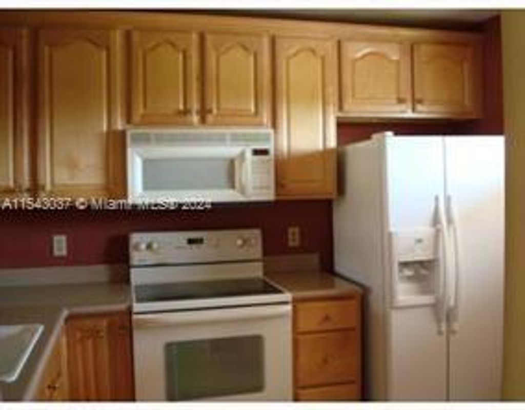 Photo of 6716 S Palmetto Cir S #201, Boca Raton, FL 33433 (MLS # A11543037)