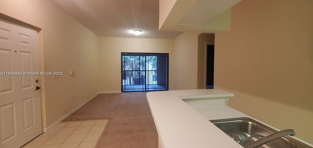 Photo of 3022 Alcazar Pl #304, Palm Beach Gardens, FL 33410 (MLS # A11429960)