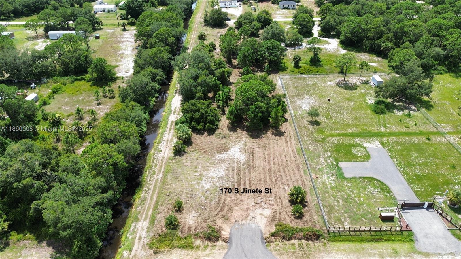 Two Adjoining 1.25 Acre Parcels in Montura Ranch Estates offered individually or together. Both have Surveys, Culverts & Driveways done with all permits, plus recently mowed and left beautiful Oaks, Pines and Palmetto Trees throughout the property. Both back up one to another and have the access road along the side where the CCWCD canal runs, they are High and Dry in Flood Zone X with excellent drainage. Properties are very close to the Community Clubhouse and Recreation Area. Ready to make plans to use as a Family Farm, Recreation or Build Modular, Manufactured or CBS Home as all are permitted. Many neighbors and adjacent parcels that are built and being developed, this is not a remote or secluded part of Montura, there is life throughout this sector. Arial video available watch it below.
