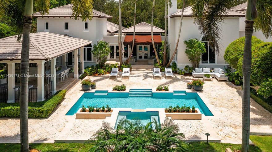 Fantastic opportunity to live on a private cul-de-sac in the exclusive, guard-gated community of Snapper Creek Lakes. Built in 2005, this 6 bed, 7.5 bath 6,528SF home was thoughtfully renovated in 2022, ensuring modern comforts and stylish living. This home boasts vaulted and beamed volume ceilings and abundant light throughout. A desirable layout features a primary suite on second level, formal living and dining rooms, an ample chef’s kitchen, and a spacious pool area with decks and gazebo perfect for entertaining. Ideal family home with basketball court, batting cage, playground, and ample yard. Snapper Creek Lakes provides amenities such as a private marina available to residents only, a clubhouse, and a 24/7 security patrol.