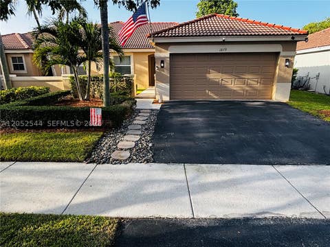 Photo of 1879 Andromeda Ln, Weston, FL 33327 (MLS # A12052544)