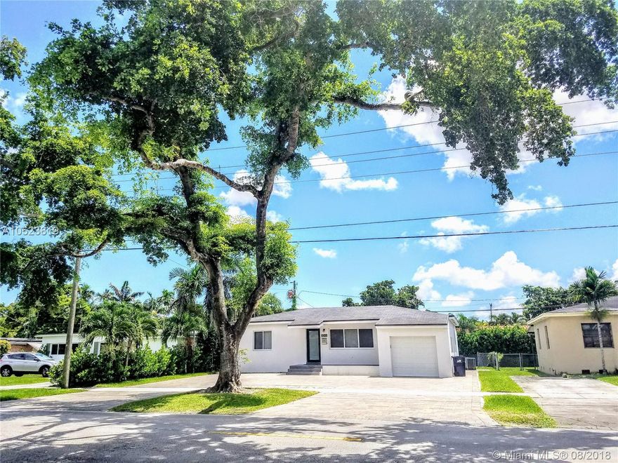 Beautiful West Miami Modern Home on tree-lined street. Completely and tastefully renovated from bottom to top! 2  Bedrooms each with custom closet.One Spa inspired bathroom, new cabinets,glass shower, bidet-toilet combo.Ceramic tile"wood plank"floors, lots of natural light flows into every room thru the new impact windows.Spacious living room and dining room.Great for entertaining. New custom kitchen impeccable cabinetry,Stainless steel appliances, wine cooler,5 burner glass range, convection oven and microwave. Relax in TV/Family Room with custom closet.Enjoy Miami's great year-round weather, dine or relax in your tropical private fenced backyard retreat! New,Key-less entry garage door,washer/dryer, water heater. Also NEW A/C ducts and unit. No Smoking nor Pets allowed .