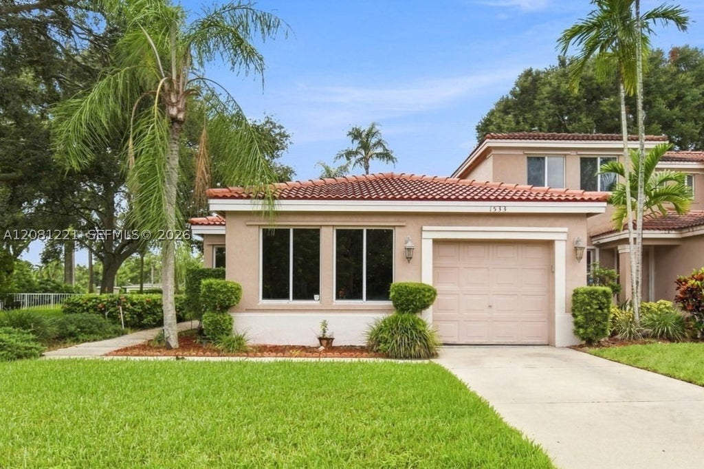 Photo of 1533 W Harmony Lake Cir, Davie, FL 33324 (MLS # A12081221)