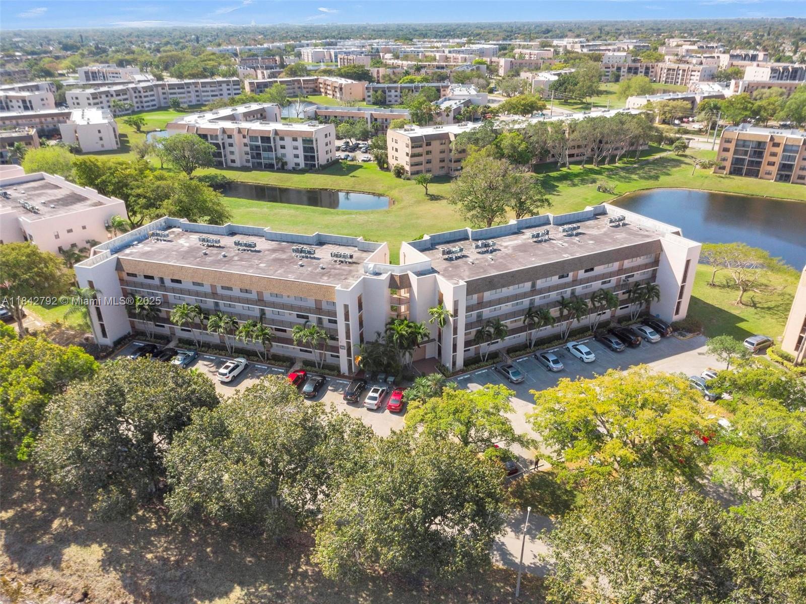 Beautifully updated and generously sized 2-bedroom, 2-bathroom condo located in desirable Sunrise Lakes Phase 4. Step inside to find brand new flooring throughout and fresh paint that gives the space a bright, modern feel. Both bathrooms and kitchen have been tastefully renovated with sleek finishes. The large primary suite includes a custom built walk-in closet for all your storage needs. Enjoy the convenience of a full-size washer and dryer in-unit, making laundry a breeze. This condo offers comfort, style, and functionality all in one—ideal for those looking to enjoy a low-maintenance lifestyle with access to community amenities and a vibrant social atmosphere.
