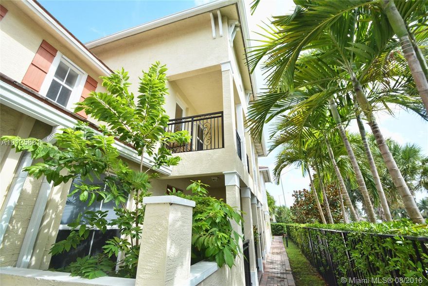 Beautiful 3 bedroom/2.5 bathroom townhouse!  Ceramic tile throughout first floor, including garage.  All stainless steel appliances. Second floor has all hardwood flooring.  In-unit laundry room. Master has walk-in closets and separate shower and tub. Granite countertops throughout entire unit. Each bedroom has balcony access. This home has been meticulously maintained! Gated community minutes from Turnpike, Sawgrass Expressway and I-95. Walking distance to The Promenade. This home is a definite must see!