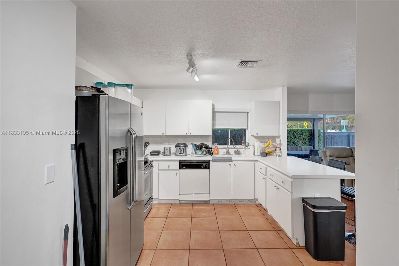 SHOMA HOMES AT TAMIAMI IV - Residential