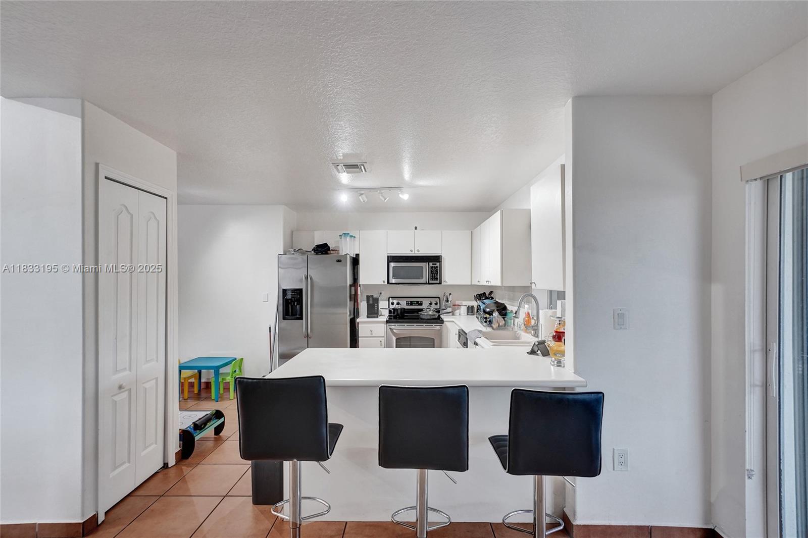 SHOMA HOMES AT TAMIAMI IV - Residential