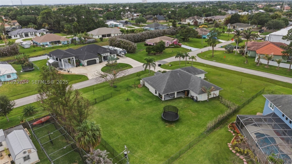 Photo of 2055 SW Aaron Ln, Port St Lucie, FL 34953 (MLS # A11829734)